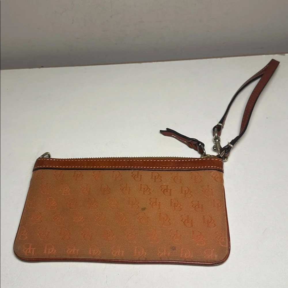 Dooney & Bourke Tan monogram all over print Wristlet